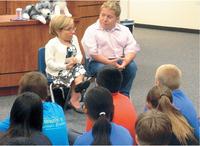 The couple like to give back by visitng schools to talk to kids about bullying